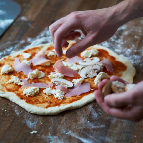 Pizza selber belegen